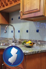 new-jersey map icon and a granite countertop